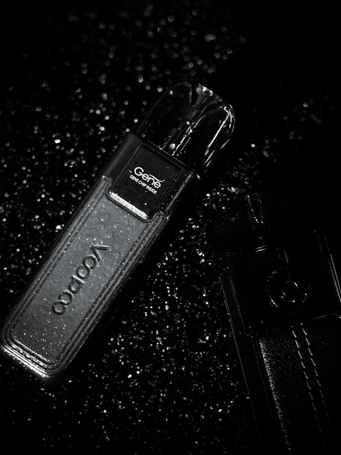 Black and White Photo of Vape in Leather Case